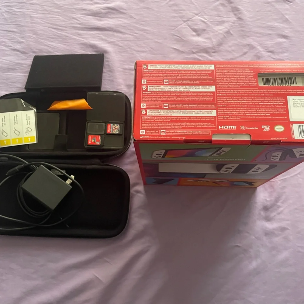 Nintendo Switch with Gray Joy-Con and Accessories